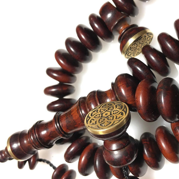 16mm Snakewood with hand engraved details in solid brass.
